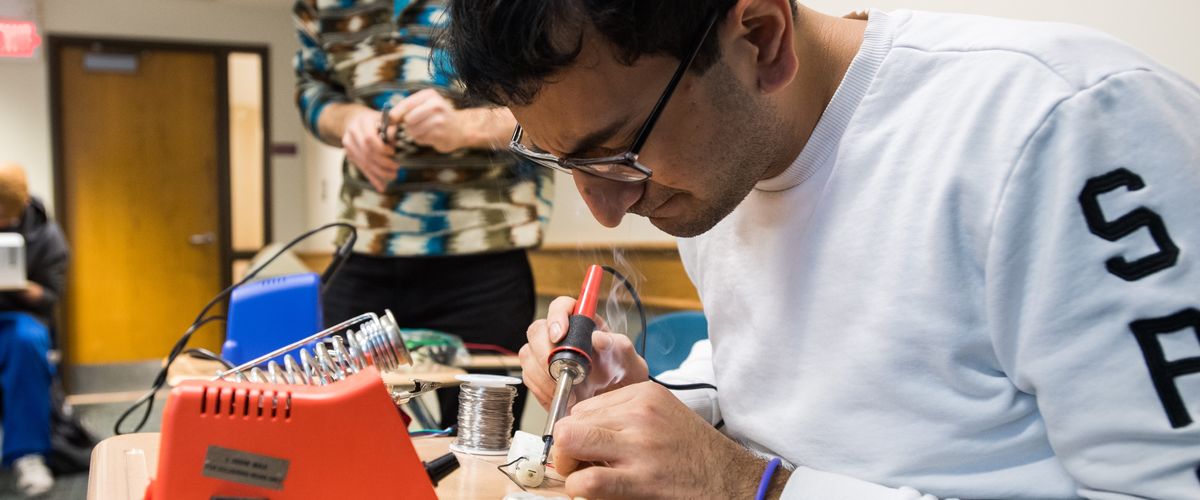Mahdiul Chowdhury (ENG'19) in ENG professor Roberto Tron's Intro to Robotics class in which students will build and program simple robots. Photo by Cydney Scott for Boston University Photography