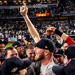 Chris Sale celebrates with teammates after clinching the American League Division Series against the New York Yankees on October 9, 2018, at Yankee Stadium.