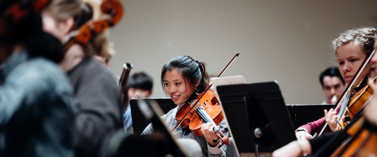 Student playing the violin