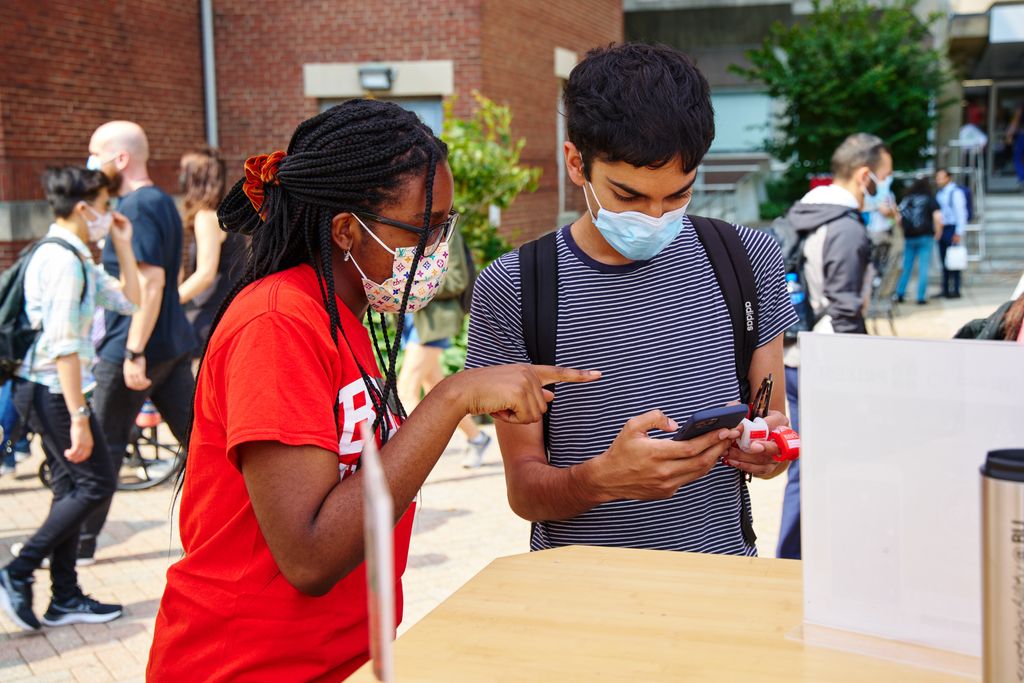 Crystal Sealey with a BU student working a BU Sustainability Event
