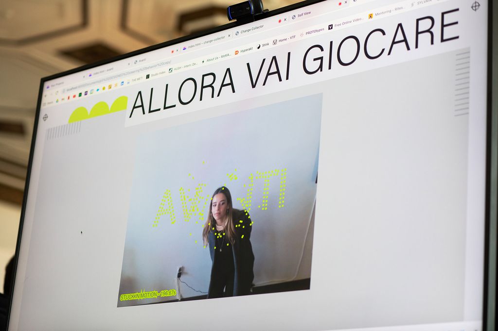 Andreina De La Blanca (CFA’23) demonstrates one of the “mini experiences,” or interactive games, she created for her graphic design thesis.
