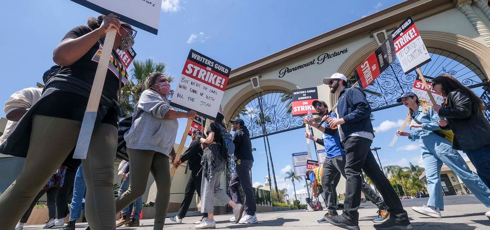 Members of the Writers Guild of America picket outside Paramount Pictures on May 5, 2023, in Los Angeles