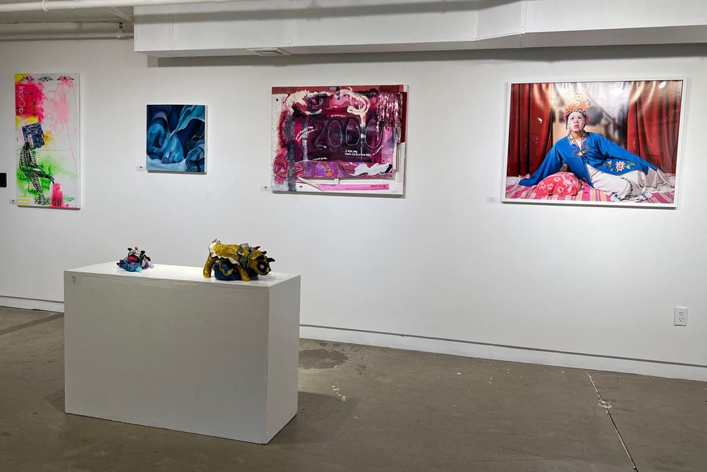 Bittersweet Birthday (center right), a mixed-media oil painting by Linda Obobaifo (CFA’24), on display at Piano Craft Gallery.