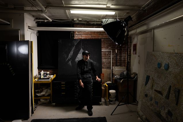 Artist S. Proski in their studio