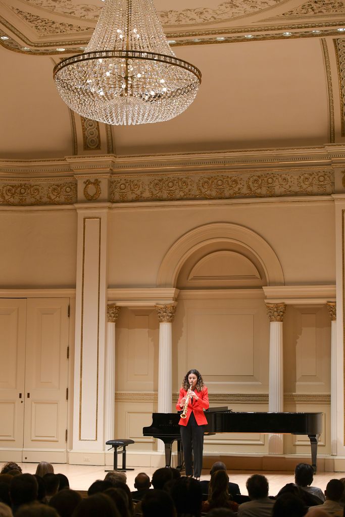 Soprano saxophone player on stage at Weill Recital Hall at Carnegie Hall