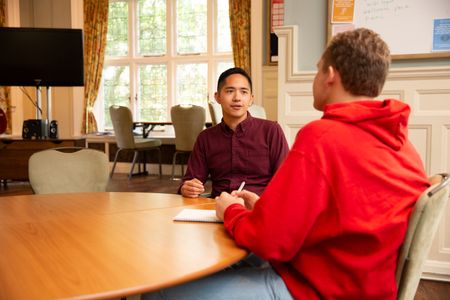 CGS academic advisor meeting with student