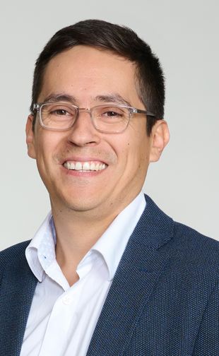 Paulo Miño smiling portrait.
