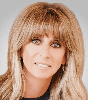 Bonnie Hammer smiling portrait.