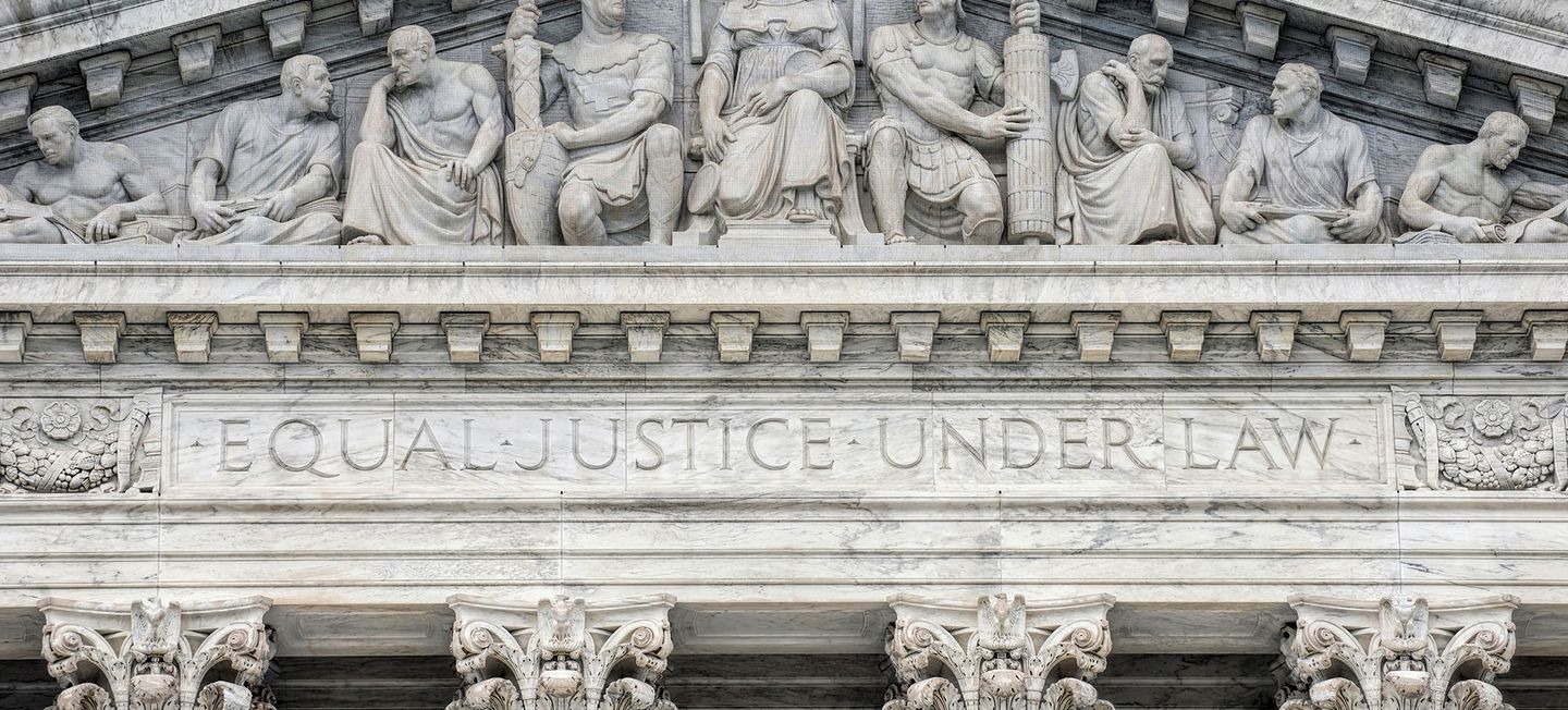 Supreme Court building with engraved text "Equal Justice Under Law."