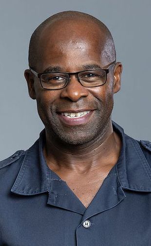 Tunji Akinsehinwa smiling portrait.