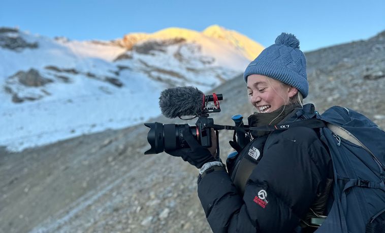 Lauren Fox operates a camera in the Himalayas.