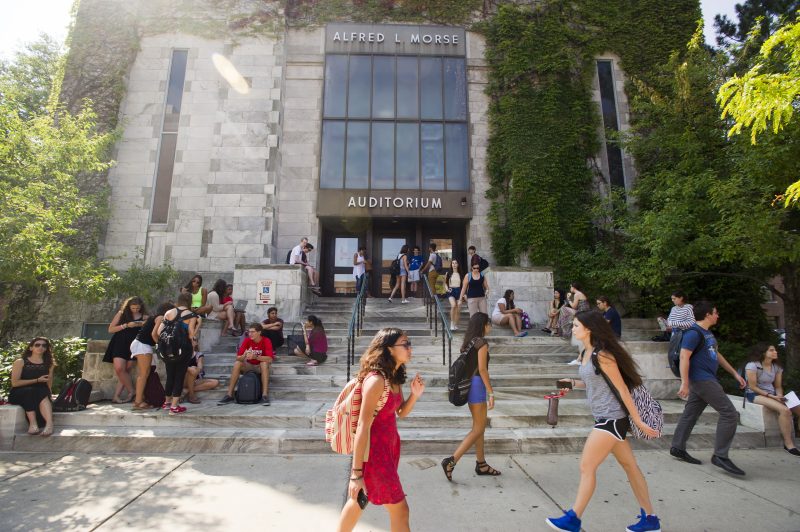 Students come and go from class outside Alfred L Morse Auditorium
