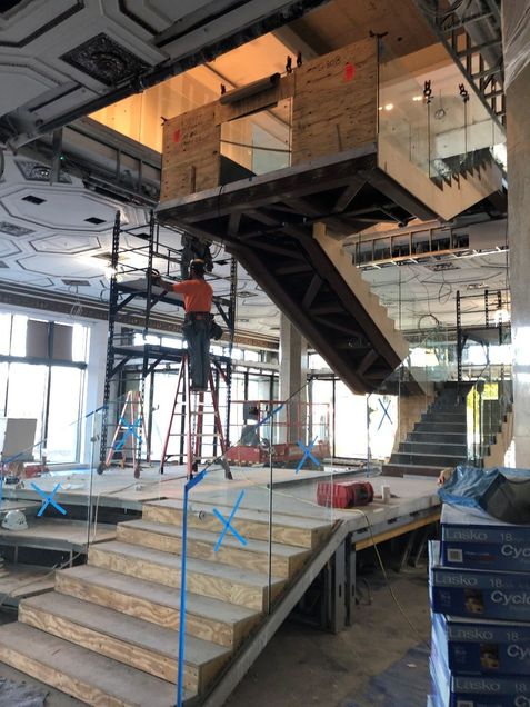 Stair-5 glass framing around sprinkler line