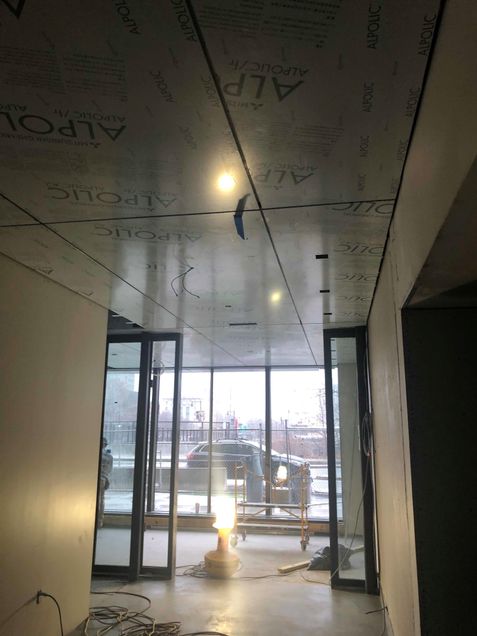 Interior ceiling panels at new vestibule.