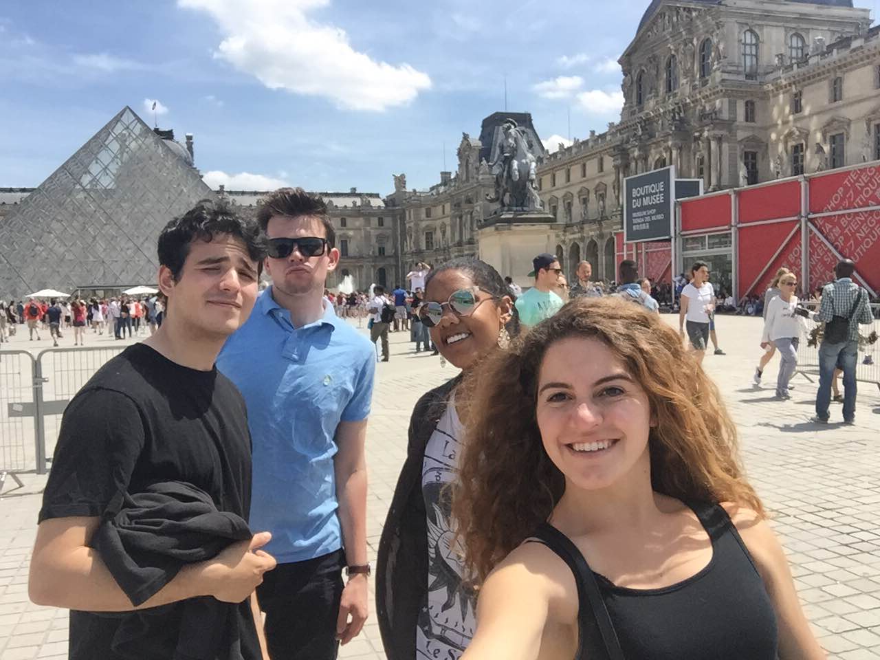 Sandy Karp and friends in front of the Louvre during her summer with the College of General Studies London program.