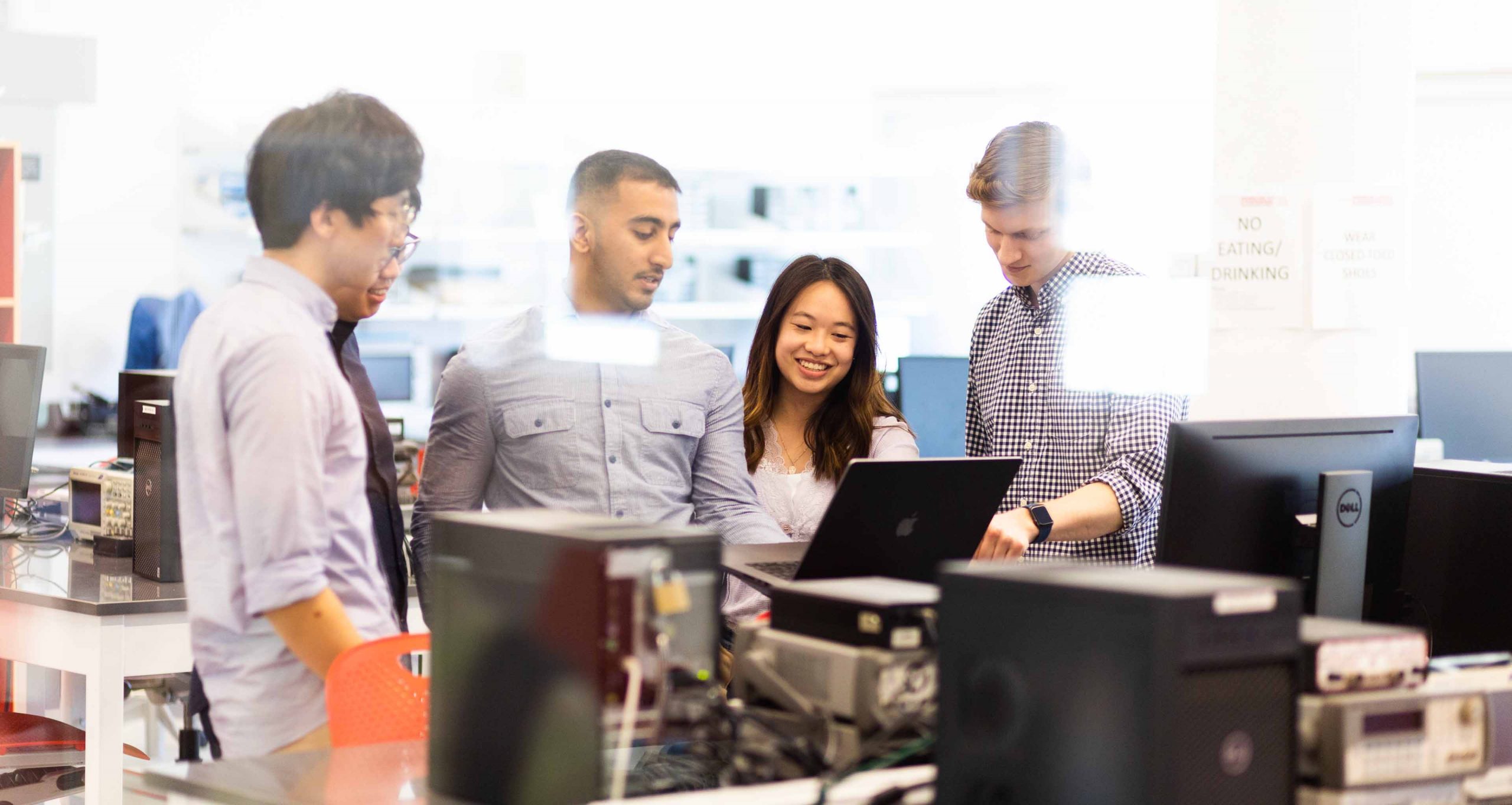 student in bright lab chatting
