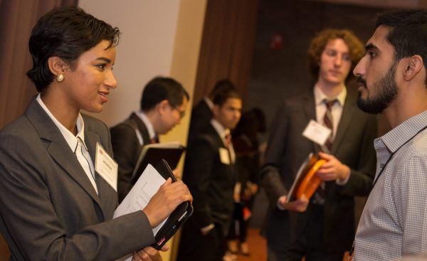 A recruiter chats with a student at the Career Fair