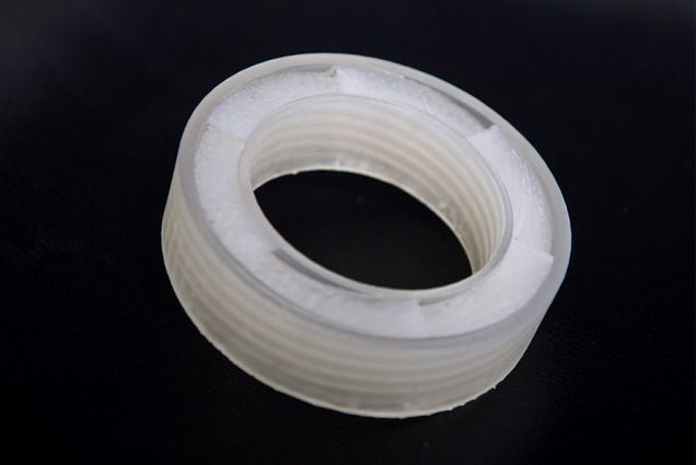 Detail photo of a ring shaped noise cancellation device built using an acoustic metamaterial both developed by Boston University engineers.