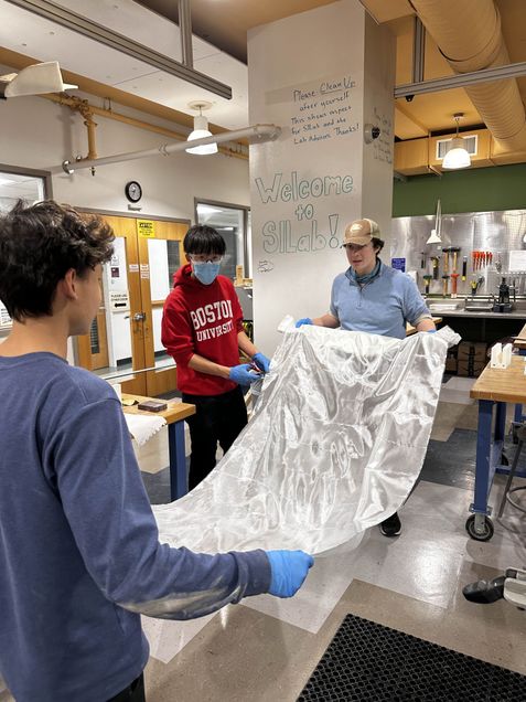 Students working on aircraft