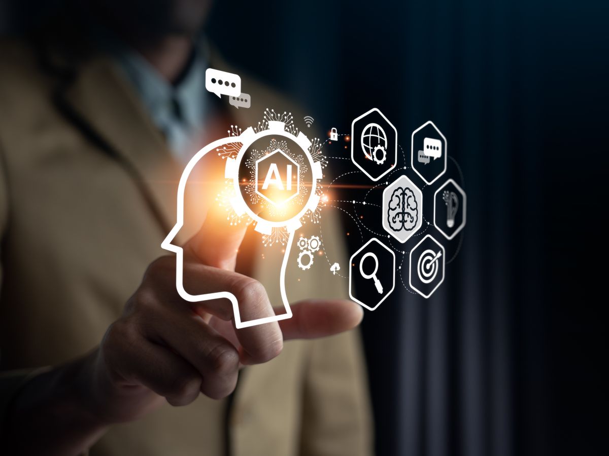 Man pointing to AI hologram