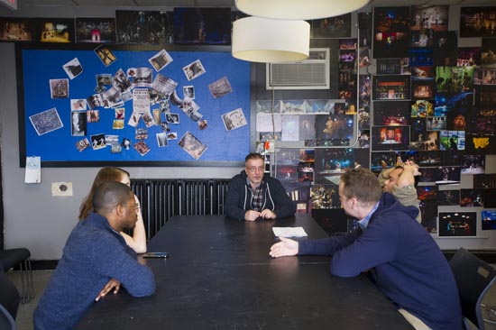 Noone (center) presiding over his Scene Design II class for graduate students.