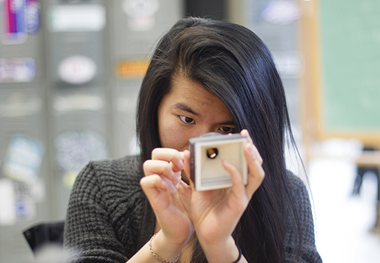 Annie Chiang (SMG 15) puts together a 3D printed camera in Toni Pepe's photography class on Thursday, March 5, 2015. Photo By Jackie Ricciardi