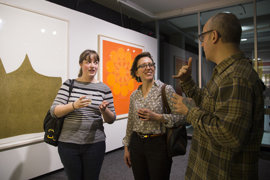 The artist (far right) with Caroline Marsden, CFA senior admissions coordinator (far left), and Melissa Lund, CFA financial aid officer, at the January 23 opening reception for The Beatles Are Dull and Ordinary. Photo by Esther Ro (COM’15)