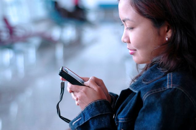 Woman using her cellphone
