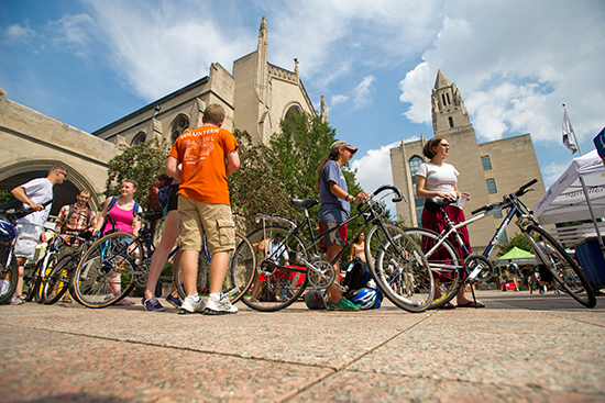 cyclists waiting in line for a free bicycle tune-up at the Boston University Sustainability Festival