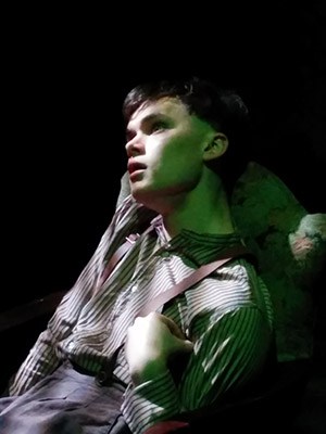 Conor Proft (CFA’17) in the title role of Cripple Billy Claven in the CFA production of <em>The Cripple of Inishmaan.</em>