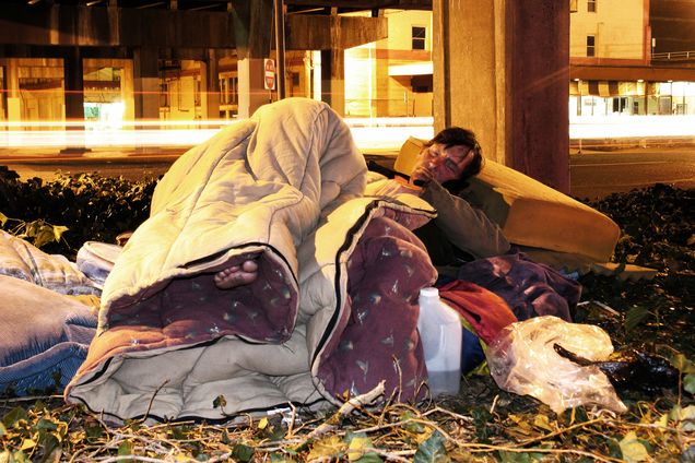 Homeless man sleeping on the street