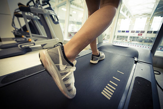 Student demonstrating proper treadmill use at FitRec.