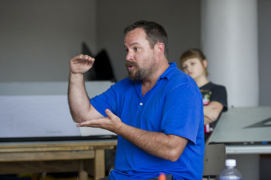 BUSTI instructor and design and production undergraduate programs head Jonathan Savage talks set design during BUSTI at CFA July 21, 2015.