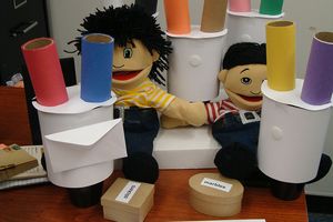 In a study at the Boston Museum of Science, Kathleen Corriveau had children drop a marble into one of two tubes to assess their preference for written or oral instructions to guide their actions