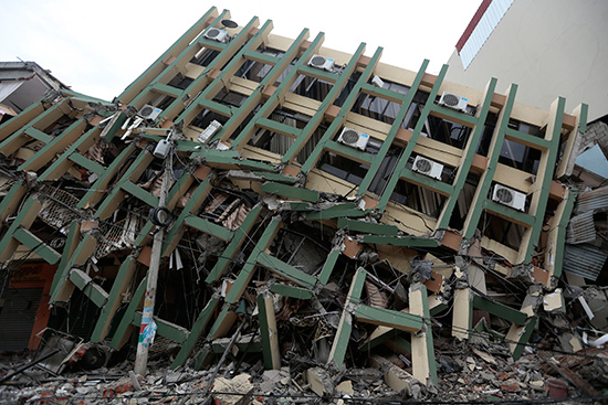 View of a fallen building after a 7.8-magnitude quake in Portoviejo, Ecuador on April 17, 2016