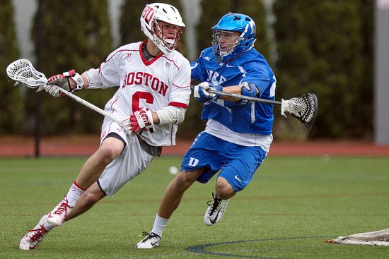 Boston University sophomore Jack Wilson (left) faces off against Ethan Powley of Duke University player during BU's final men's lacrosse game of the season at Nickerson Field Sunday. The Terriers fell to Duke 15-8. Photo by Alexandra Wimley (COM'17)