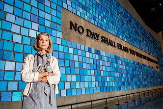 9/11 Memorial Museum Head Curator Jan Seidler Ramirez standing in front of the Virgil Quote exhibit at the 9/11 Memorial Museum