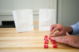 experiment used by Boston University psychology professor Peter Blake where children were given 10 Starburst candies and asked them divide the candies into two bags, one to keep and one to give away