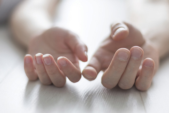 two hands touching each other