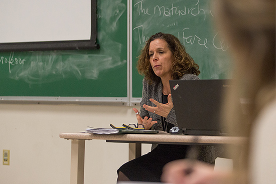 Professor Hallstein speaks to class.