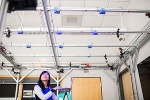 PhD candidate Emily Lam works with smart lighting sensors as part of Thomas Little's research with the Lighting Enabled Systems & Applications Engineering Research Center (LESA ERC)