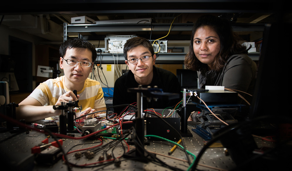Graduate students in the Boston University BOTLab, Fei Teng  (ENG’18), Kavon Karrobi (ENG’19), and Syeda Tabassum (ENG’18)