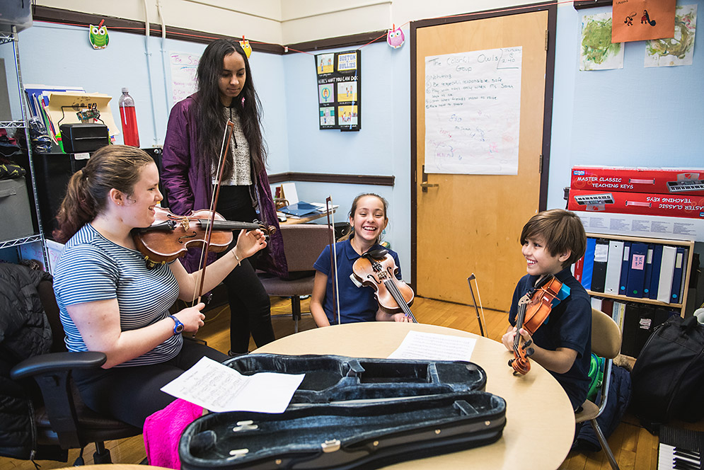 BU students with elementary school music students