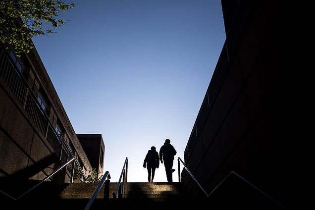 students going upstairs at sundown