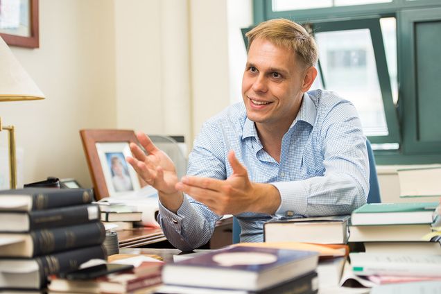 Alexander Nikolaev at desk