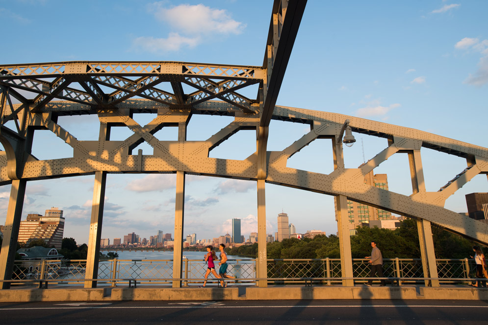 Runners on BU Bridge at sunset