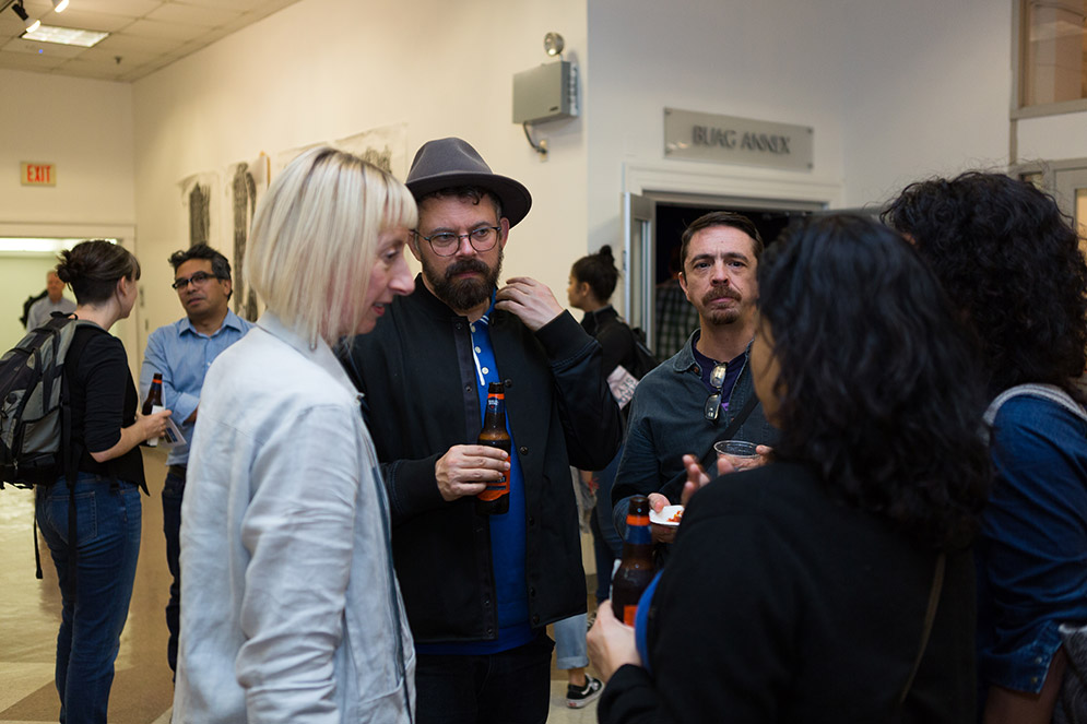 The artist (second from left) and guests at the opening reception for Geoffrey Chadsey: Heroes and Secondaries at the Faye G., Jo, and James Stone Gallery on October 19