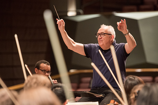 Grammy-winning conductor Bramwell Tovey rehearses with the Boston University Symphony Orchestra