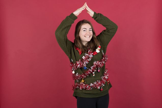 Sophie Phillips (CAS’21) shows off her ugly sweater by posing like a Christmas tree