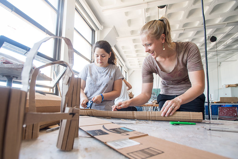 Karina Chaoul (left), of Houston, Tex., a student in CFA’s intensive four-week Visual Arts Summer Institute for high school students, in a sculpture class taught by Claire Roll (CFA’16) (right)